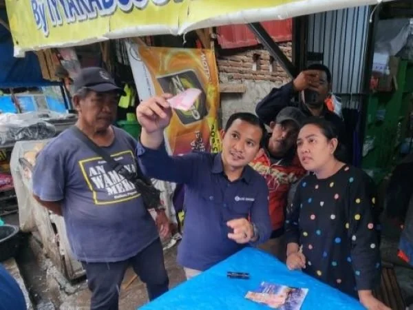 BI saat mengadakan sosialisasi terkait uang palsu di Pasar Minasa Maupa, Gowa (Dok : Ist).