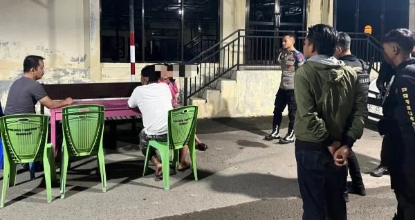 Pasutri saat diamankan di Polresta Mamuju (Dok : Ist).