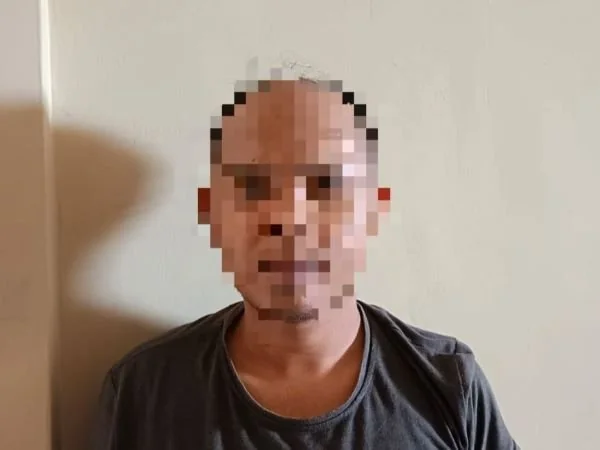 Pelaku saat berhasil diamankan Polisi (Dok : Ist).