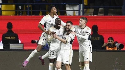 Real Madrid menyingkirkan Atletico Madrid untuk melangkah ke partai final Piala Super Spanyol. (REUTERS)