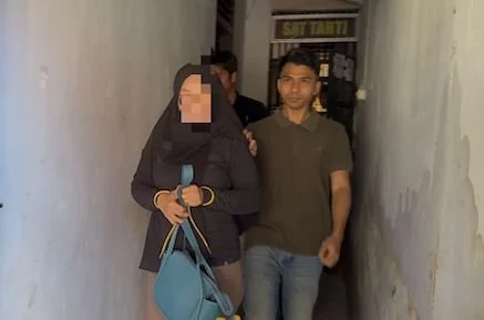 Pelaku penipuan oknum ASN Pemprov Sulbar saat digelandang oleh Polisi(dok:ist)
