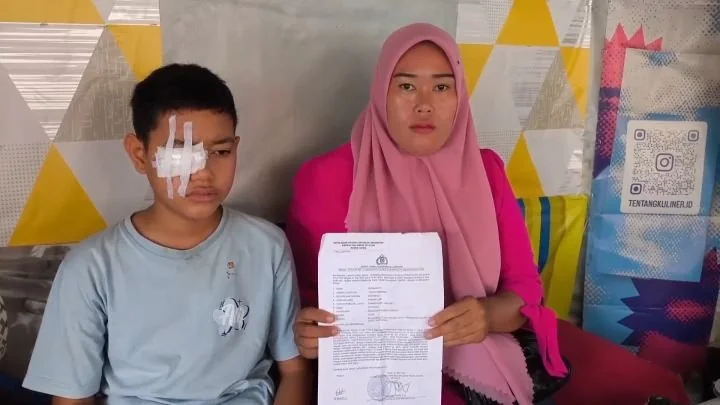 Korban saat melapor ke pihak kepolisian (Dok : Int).