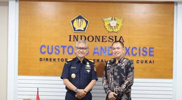 Komisi Pengawas Persaingan Usaha (KPPU), M. Fanshurullah Asa, dan Direktur Jenderal Bea Cukai (DJBC), Askolani.
