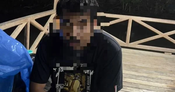 Pria yang diamankan karena mengalami gangguan keterbelakangan mental serta dalam keadaan tersesat hingga tiba di wilayah Kalumpang. (Dok: Ist)