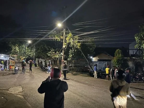 personil Polsek Biringkanaya saat membubarkan kegiatan lomba lari dilokasi (Dok:Ist)