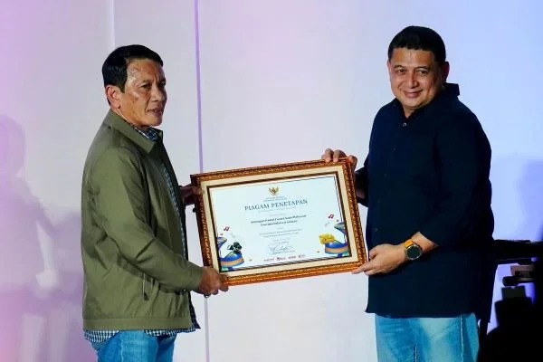 Kepala Kantor Wilayah Kemenkum Sulsel, Andi Basmal dan Wali Kota Munafri Arifuddin (Dok : Ist).