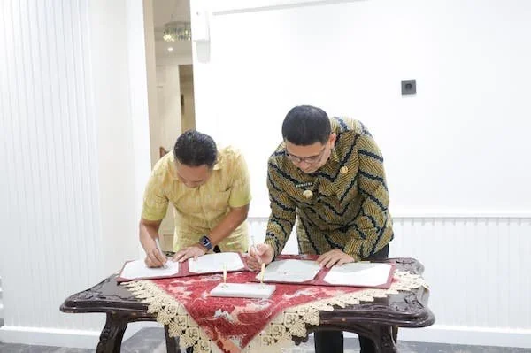 Penandatanganan nota kesepahaman (MoU) antara Pemkot Makassar dan Bukit Baruga, (Dok: Ist).