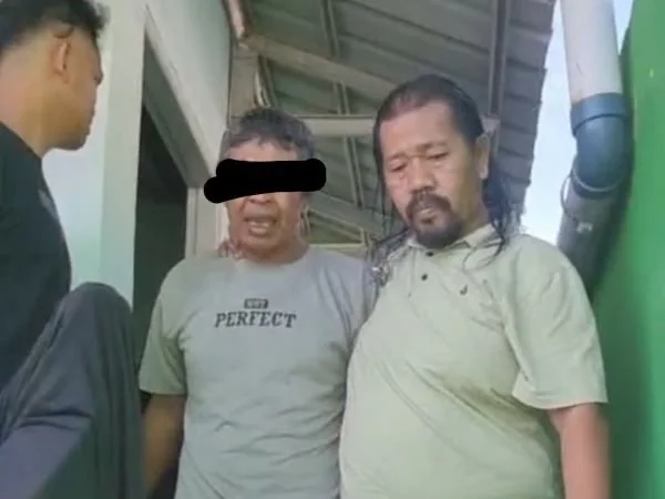 Dantim Resmob Polres Jeneponto, Aiptu Abd. Rasyad saat membekuk S di tempat persembunyiannya (Dok : Ist).