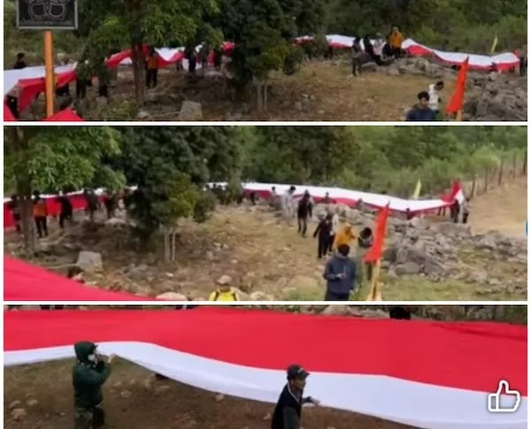 Warga Desa Ujung Bulu, saat mengibarkan bendera 80 meter di Agrowisata Bontolojong, Ujungbulu, Jeneponto