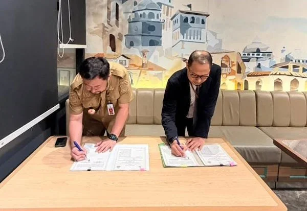 Penandatanganan Perjanjian Kerja Sama (PKS) Elektronifikasi Perpajakan antara Bapenda Kota Makassar dan Bank Sulselbar (Dok: KabarMakassar).
